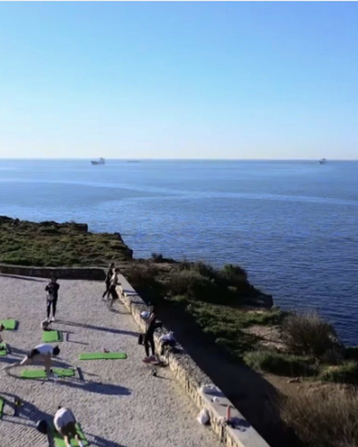An outdoor stretch class at LA Fit